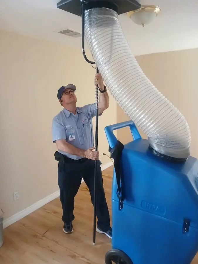 Mini Split Installation technician using HEPA equipment in Home Gardens