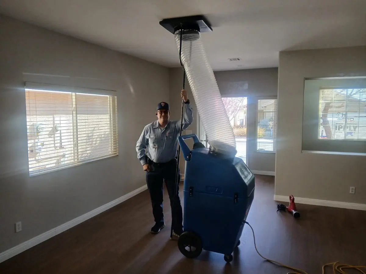 Professional Dryer Vent Cleaning work inside a Home Gardens home